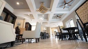 A spacious living area with a high ceiling, recessed lighting, and ceiling fans. - Fabulous 5 BR With Pool Solterra Resort (Davenport)