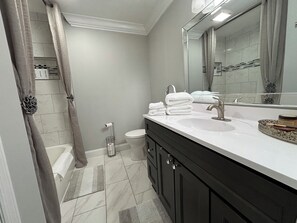 Hair dryer, towels, soap, shampoo