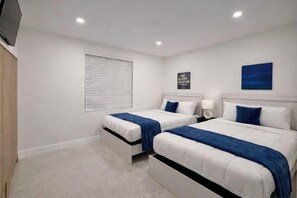 4 bedrooms, iron/ironing board, WiFi, bed sheets - Tropical Villa Retreat - Pool • Game Room • Lounge (Plantation)