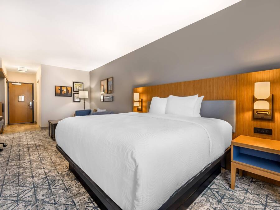 Down comforters, pillowtop beds, desk, laptop workspace