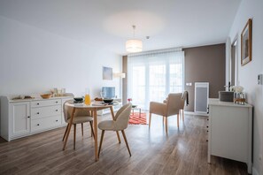 2 Bedroom Apartment | Living area | 43-inch flat-screen TV with digital channels - Quality Suites Clermont-Ferrand Stadium (Clermont-Ferrand)