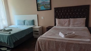 Family Double or Twin Room, Courtyard View | Desk, laptop workspace, free WiFi