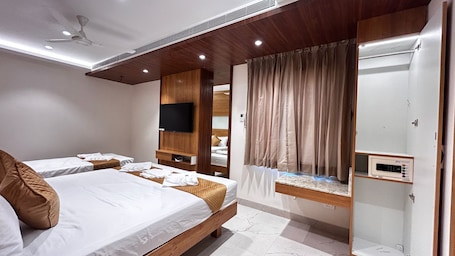 Premium Triple Room, City View | Desk, free WiFi