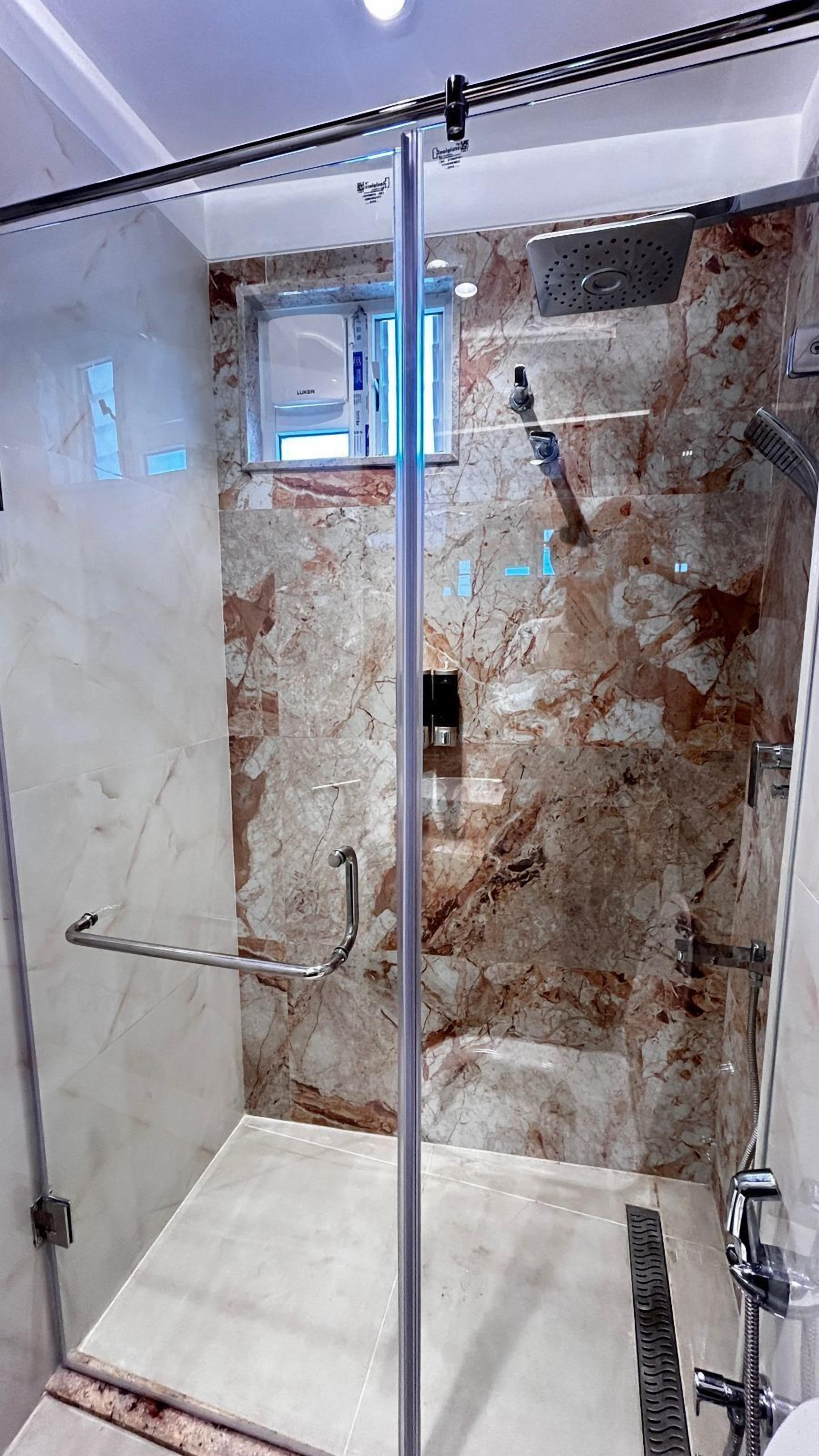 Shower, free toiletries, towels, soap