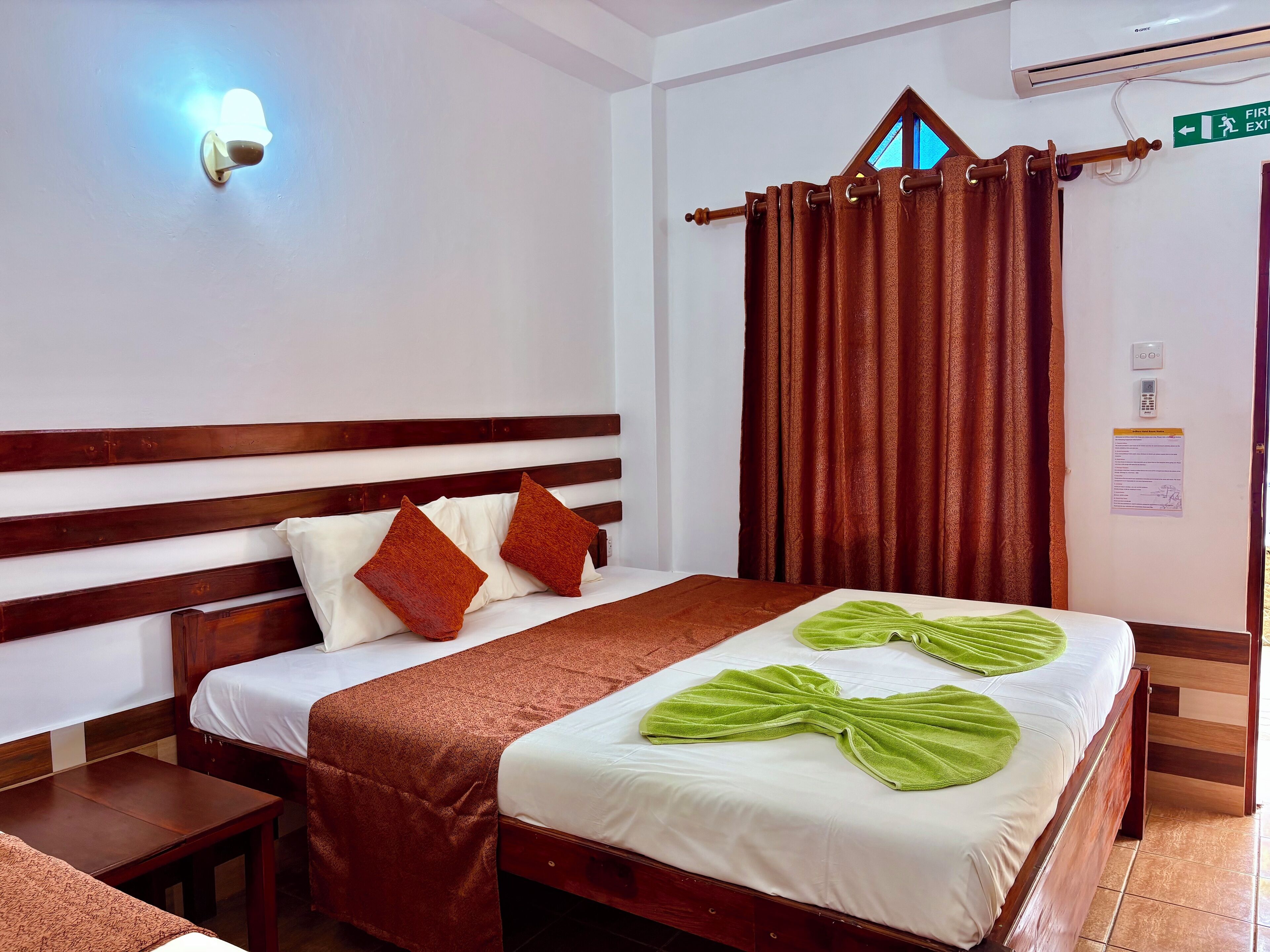 Deluxe Triple Room, Pool View | In-room safe, free WiFi