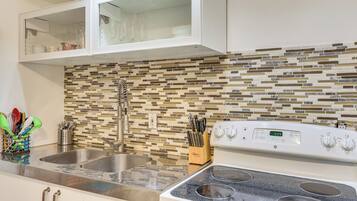 Fridge, microwave, stovetop, coffee/tea maker