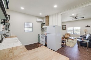 Fridge, microwave, stovetop, coffee/tea maker