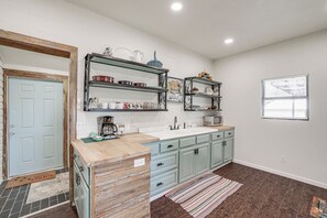 Fridge, microwave, stovetop, coffee/tea maker