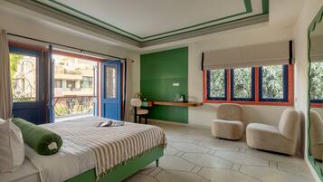 Suite, Balcony, Garden View | Premium bedding, desk, laptop workspace, blackout curtains