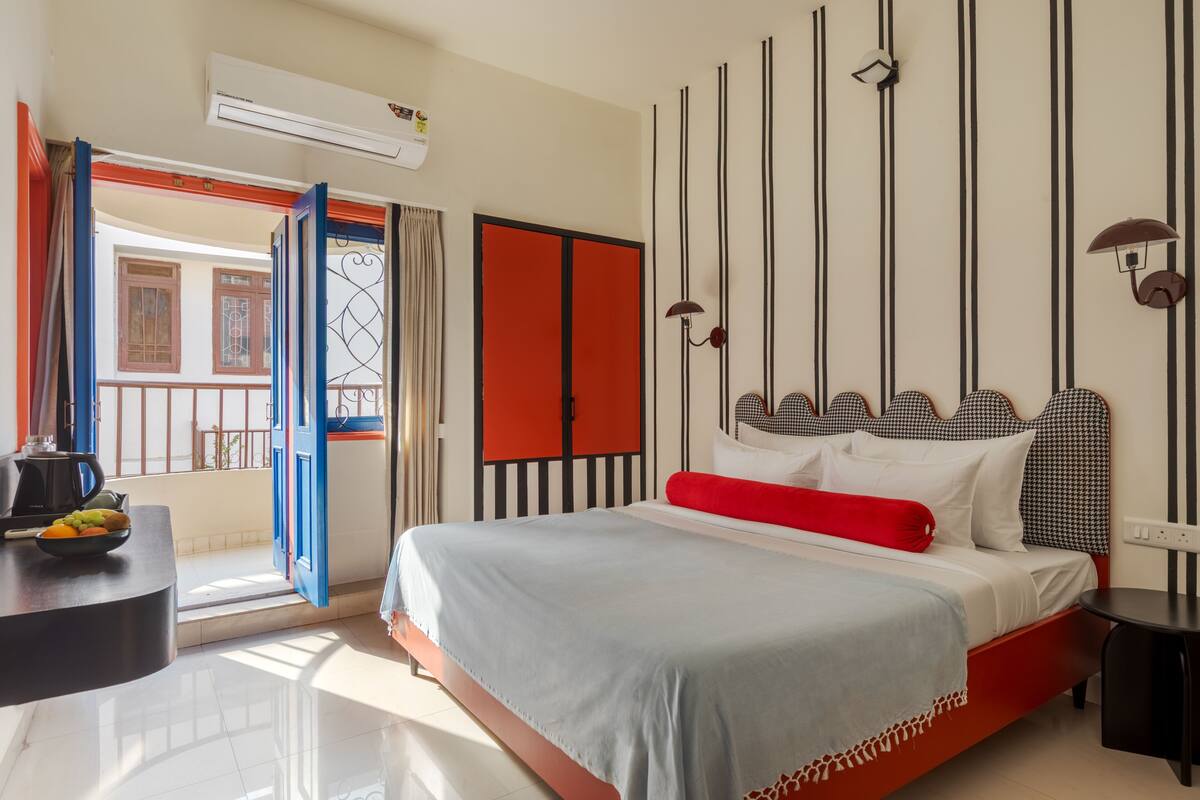 Premium bedding, desk, laptop workspace, blackout curtains