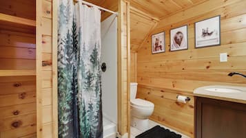 Shower, hair dryer, towels, shampoo