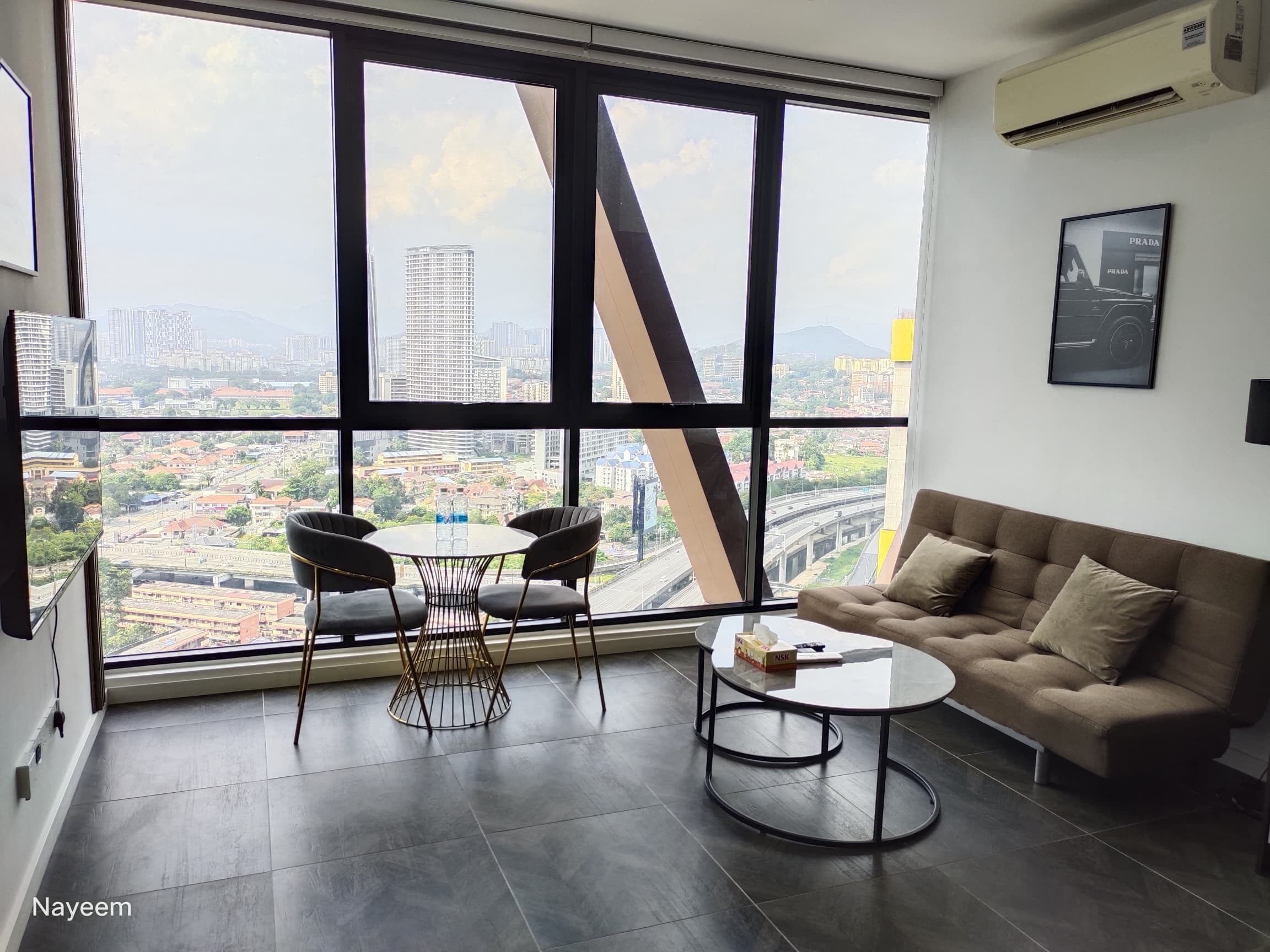 Family Apartment, 1 Bedroom, City View | Living area | 42-inch LED TV with digital channels