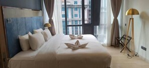 Family Apartment, 1 Katil Ratu (Queen), City View | Cadar kapas Mesir, peralatan tempat tidur premium, tilam berlapik, meja 