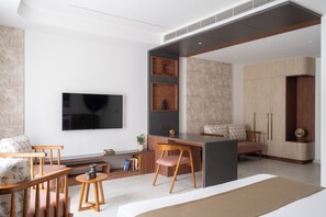 Chambre Prestige | Aire de séjour | Téléviseur connecté de 43 po avec télévision par câble