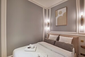 1 bedroom, desk, iron/ironing board, bed sheets