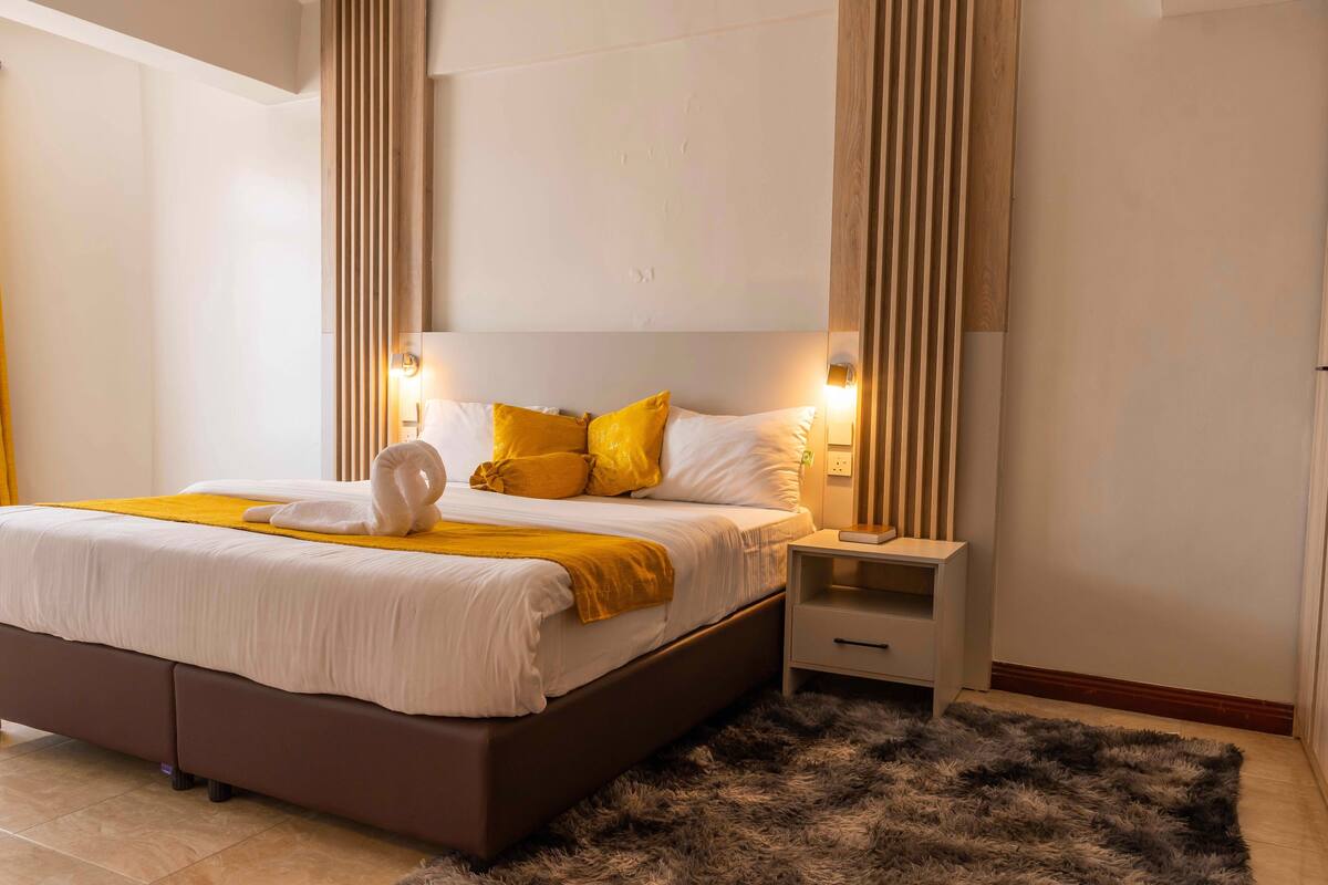 Habitación individual Deluxe | Wifi gratis y ropa de cama