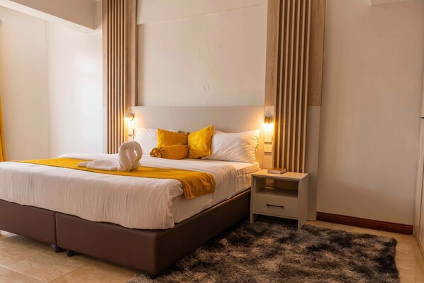 Habitación individual Deluxe | Wifi gratis y ropa de cama 