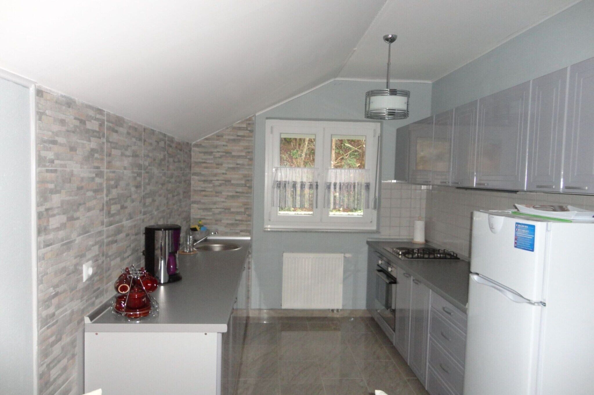 Fridge, oven, stovetop, dining tables