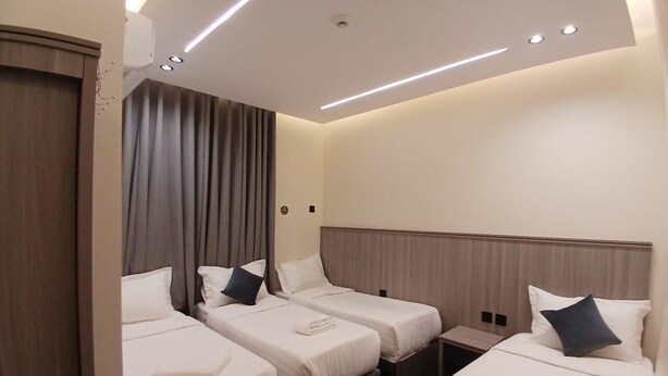 Unclassified image, 1 of 11, button - balwarat aldura Hotel (Makkah)