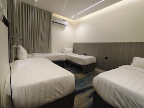 Coffres-forts dans les chambres, draps fournis
