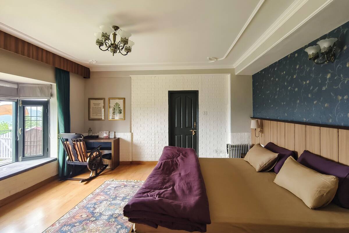 Deluxe Room, Mountain View | Individually decorated, desk, free WiFi