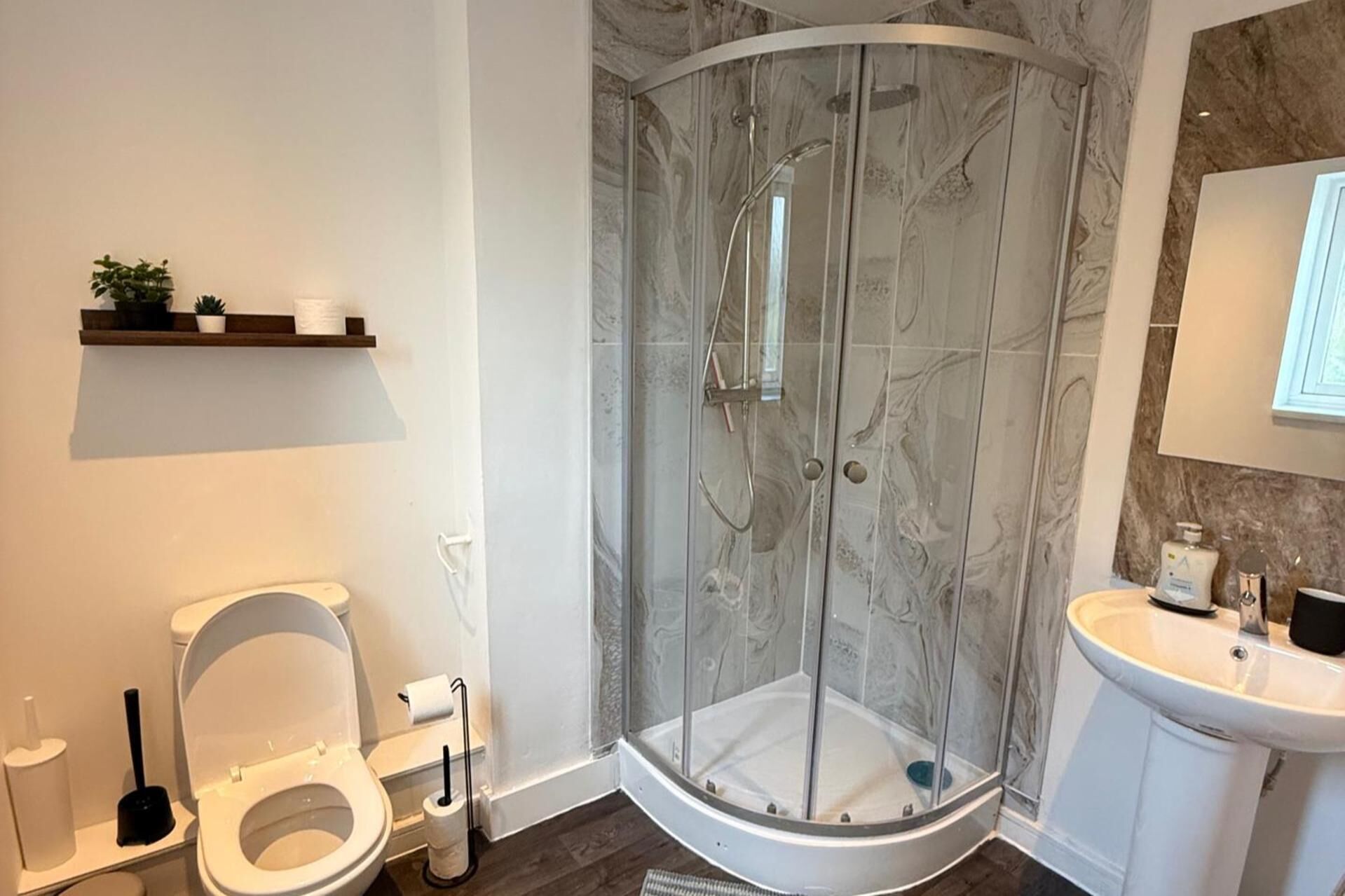 Combined shower/bathtub, deep-soaking bathtub, towels