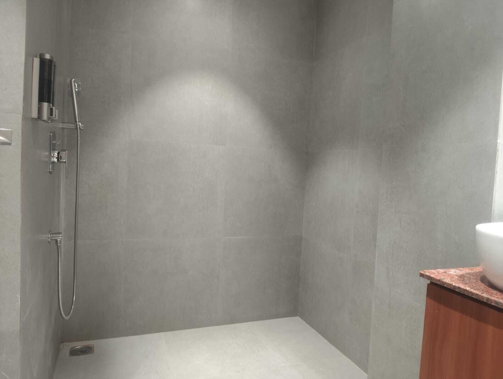 Shower, hair dryer, slippers, towels