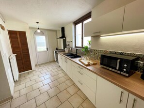 Fridge, microwave, dishwasher, coffee/tea maker