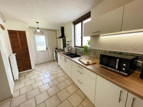 Charming 19th-Century Stone Cottage with Garden in Poitou