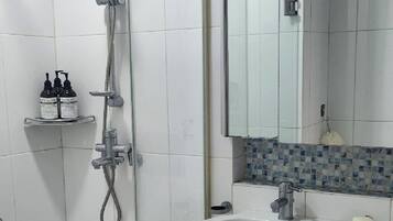 Shower, hair dryer, towels, soap