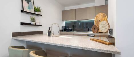 Fridge, microwave, dishwasher, coffee/tea maker