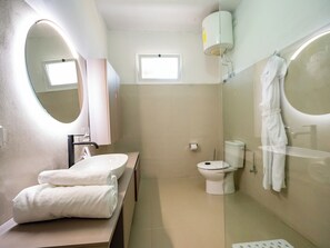 Junior Suite, Garden View | Bathroom | Shower, free toiletries, hair dryer, bathrobes - Heliconia Park Hotel & Golf Resort (Port Harcourt)