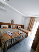 Comfort Triple Room, Balcony, City View | WiFi (free), bed sheets