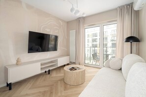 TV, offices - Jasielska 7C Poznań | Beige Apartment with Parking and Air Conditioning (Poznań)