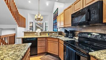 Microwave, stovetop, dishwasher, coffee/tea maker