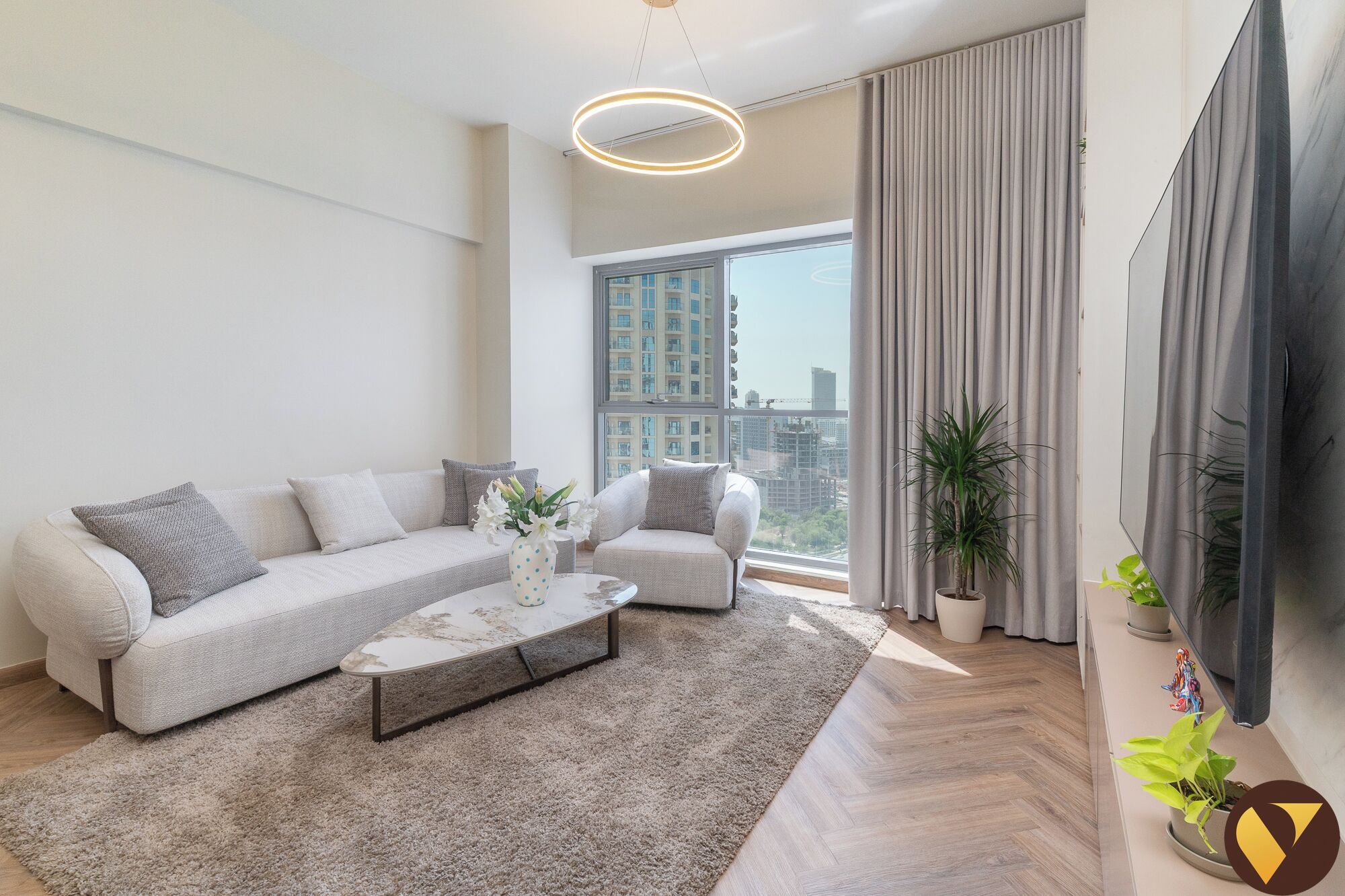 Luxury Apartment, Balcony, City View | Living area | 65-inch Smart TV with satellite channels