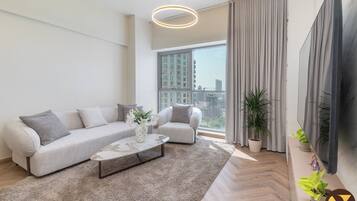 Luxury Apartment, Balcony, City View | Living area