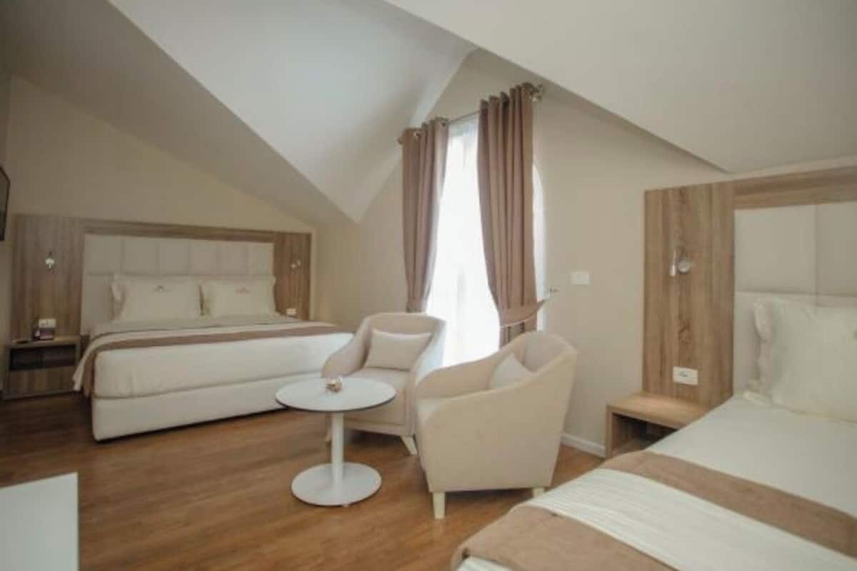 Triple Room, Balcony | In-room safe, desk, soundproofing, iron/ironing board