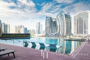 Outdoor pool - LUX 15 Northside Burj Khalifa View Suite (Dubai)
