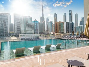 Outdoor pool - LUX 15 Northside Burj Khalifa View Suite (Dubai)