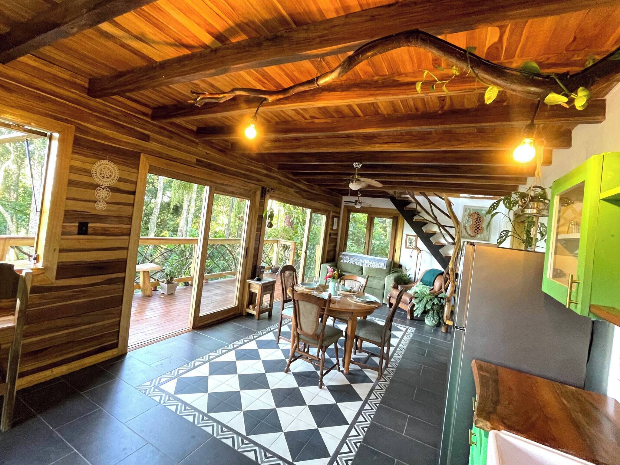 Cabin, 1 Bedroom, Balcony, Garden View | Living area | Books