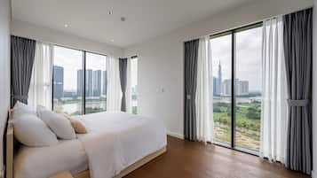 Family Apartment, 3 Bedrooms, Balcony, City View | Memory foam beds, desk, laptop workspace, blackout drapes