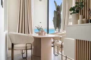 Dining - Modern 2BD Retreat with Private Pool in JVC (Dubai)