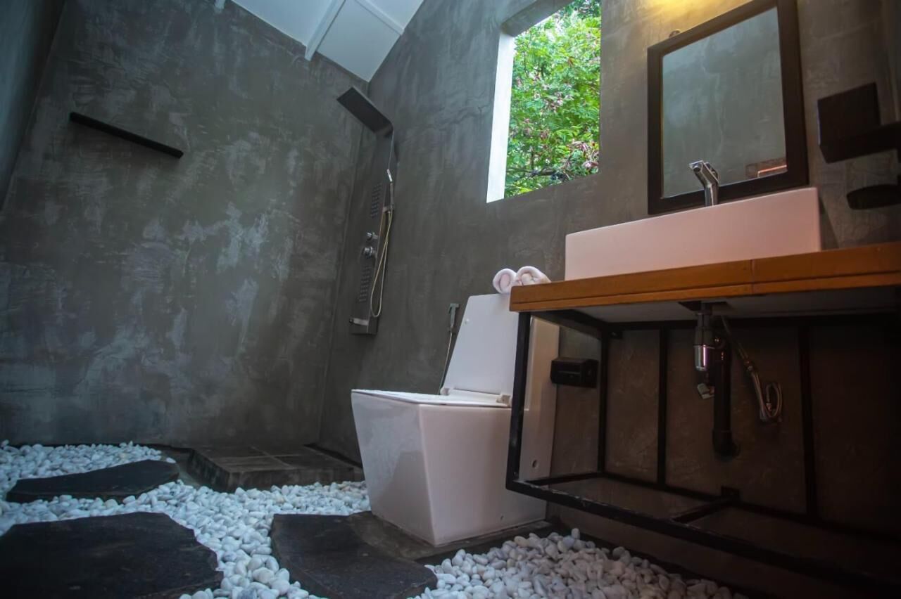 Quarto triplo luxo, sacada, vista para o jardim | Wi-Fi de cortesia