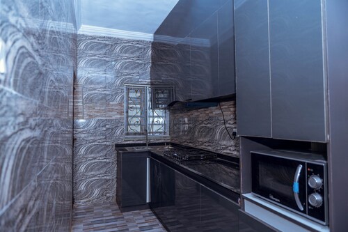 2025-Built Lavish 3BR Gated Suite #2 in GRA Benin City—24/7 Power & Security!