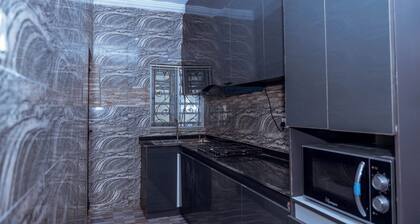 2025-Built Lavish 3BR Gated Suite #2 in GRA Benin Cityâ24/7 Power & Security!