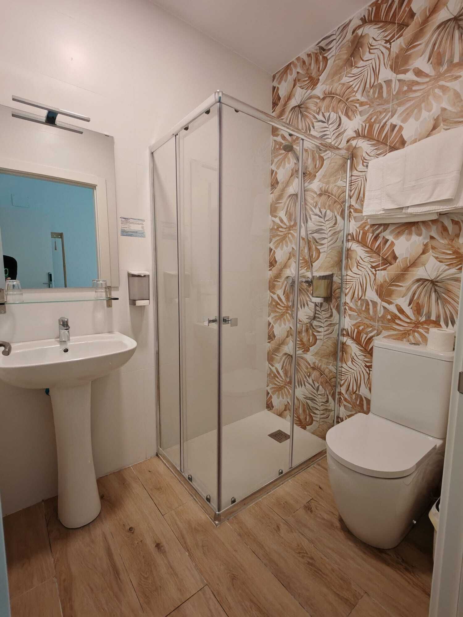 Quadruple Room | Bathroom | Shower, hair dryer, towels, soap