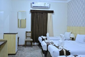 Quadruple Room | Bathroom | Combined shower/tub, towels, soap, shampoo - Safeer Almisk Hotel (Makkah)