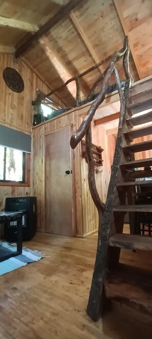 Cabaña panorámica, patio, vista al jardín | Área de sala de estar