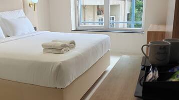 Premium Room | In-room safe, desk, laptop workspace, blackout curtains
